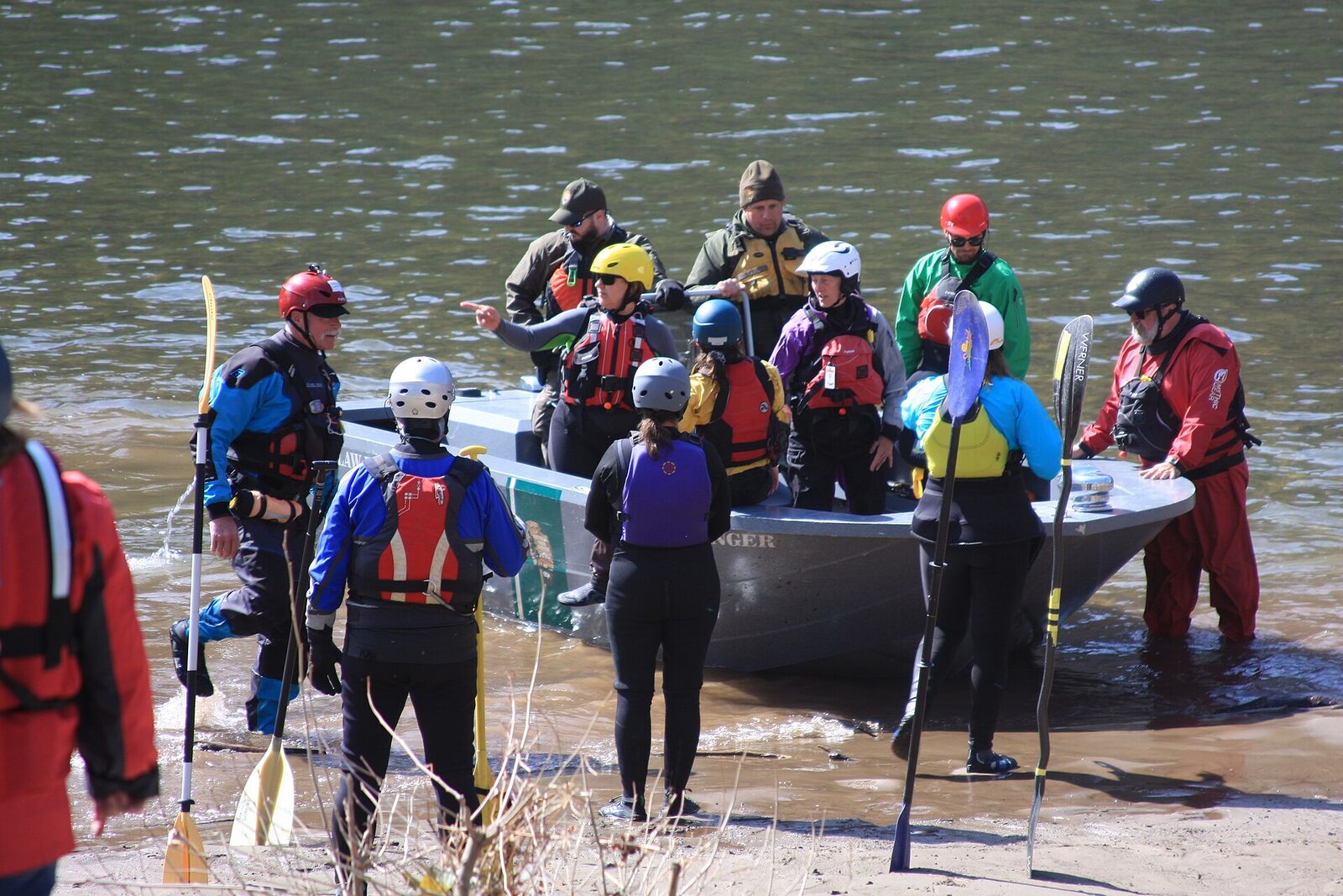 Boaters wearing properly fitted life jackets