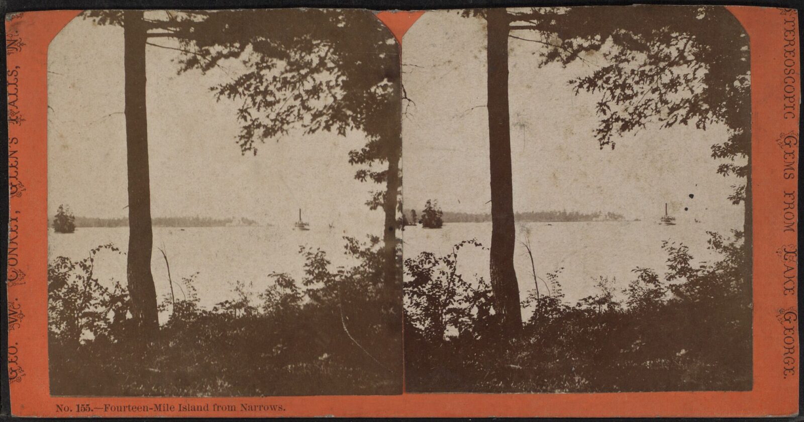 Wooded islands and mountain shoreline on Lake George